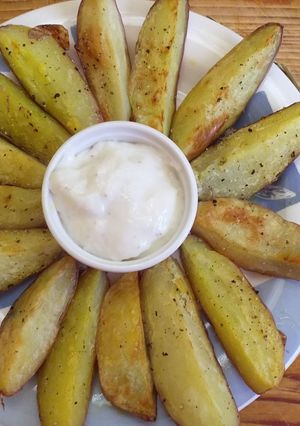 Una foto de Papas rústicas a la pimienta