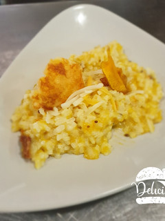 Una foto de Risotto de calabaza y tomates secos