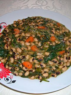 Una foto de Guiso de alubias careta con ortigas - veggie