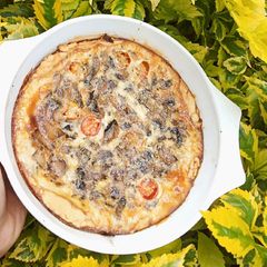 A picture of Vegetarian Mushroom and cherry tomato quiche.