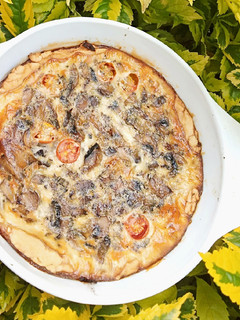 A picture of Vegetarian Mushroom and cherry tomato quiche.