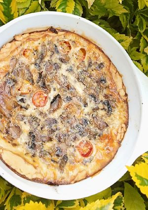 A picture of Vegetarian Mushroom and cherry tomato quiche.