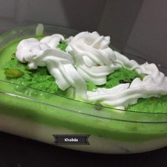 A picture of Pistachios Rasmalai vanilla mousse fruity trifle.