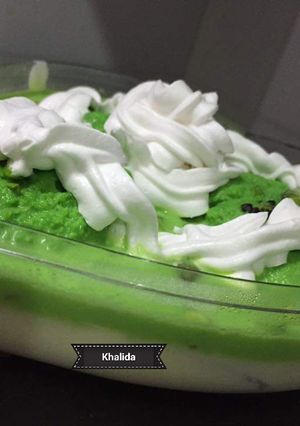A picture of Pistachios Rasmalai vanilla mousse fruity trifle.