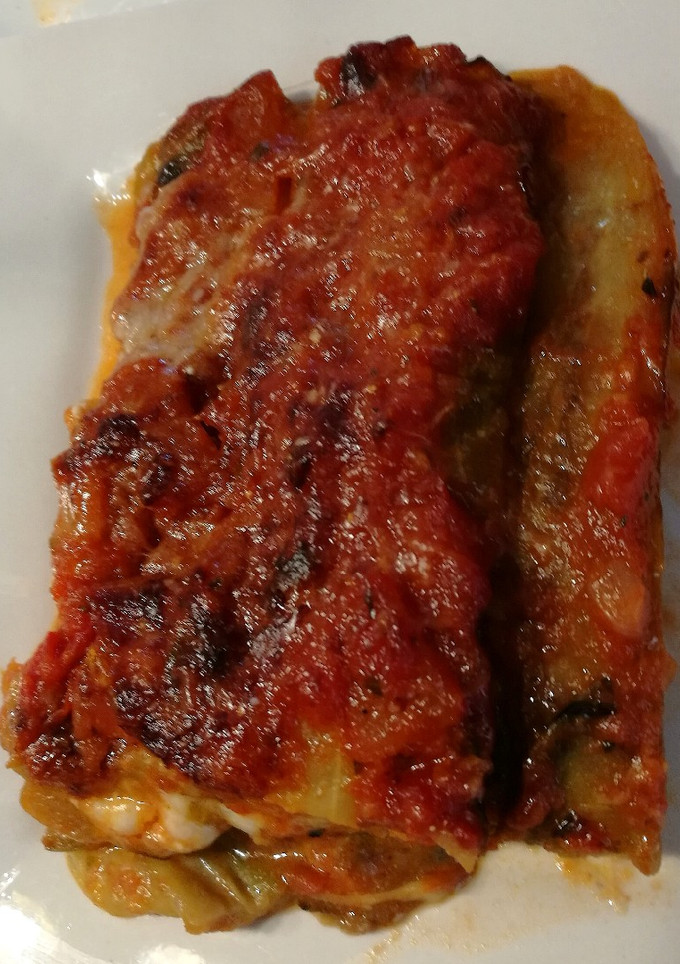 Una foto de Parmigiana de berenjenas 🍆🧀🍅