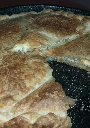 Una foto de Tarta de cebolla y aceitunas verdes