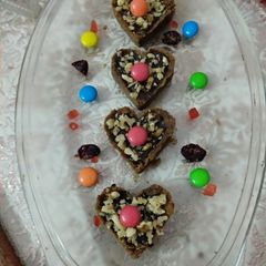 A picture of Eggless Cake tarts with chocolate and walnuts.