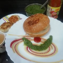 A picture of Oats & Potato Tikki Burger.