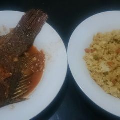 A picture of Fried fish and veg rice.