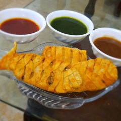 A picture of Fish cheesy samosa.