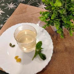 A picture of Detox tea made with holy basil,ginger and green cardamom.