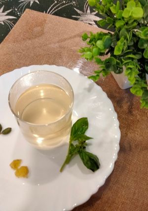A picture of Detox tea made with holy basil,ginger and green cardamom.
