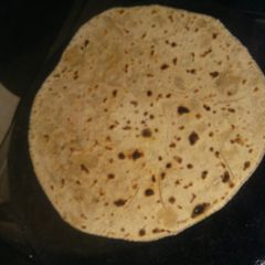A picture of Aloo+achaar mix paratha.