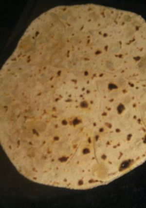 A picture of Aloo+achaar mix paratha.