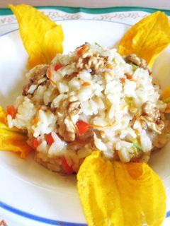 Una foto de Risotto con flores de calabacín
