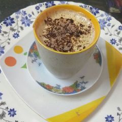 Creamy hot brown coffee A picture of Creamy hot brown coffee.