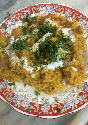 A picture of Creamy tomato and ginger rice.