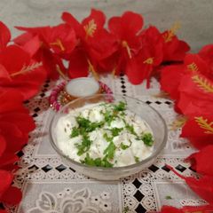 A picture of Alu Curd raita.