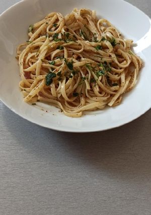 Foto di Spaghetti con pancetta e pane tostato