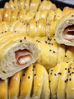 Una foto de 🧀🥖 Pancito relleno de queso con técnica Tang zhong 🥖🧀