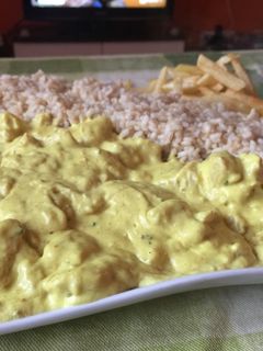 Una foto de Pollo al curry