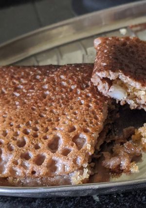 नाचणीचे कप्पी घावणे (nachniche kappi ghavane recipe in marathi) रेसिपी चे मुख्य फोटो 