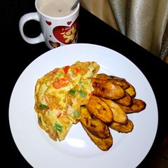Veggies Omlette & fried plantain A picture of Veggies Omlette & fried plantain.