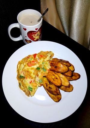 A picture of Veggies Omlette & fried plantain.