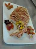Arrosto di rana pescatrice, con ripieno di castagne, porri e albicocche secche avvolta nel guanciale