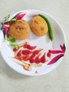 चटपटीत कॉर्न कचोरी (corn kachori recipe in marathi) रेसिपी चे मुख्य फोटो