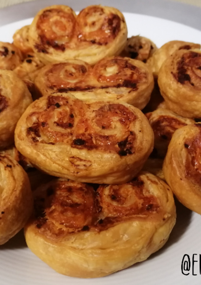 Una foto de Palmeritas de hojaldre de bacon y queso
