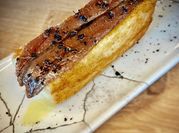 Una foto de anchoas en lata