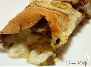 Foto di Crepes di farina di castagne con crema di funghi e provola