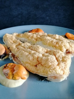 Una foto de Lubina al horno con mejillones