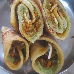 A picture of Stuffed moong dal wrap.