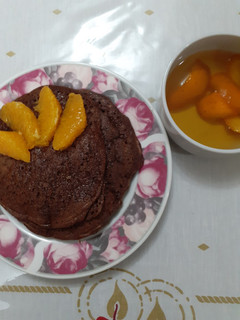 Una foto de Hot cakes de chocolate y naranja sin harina
