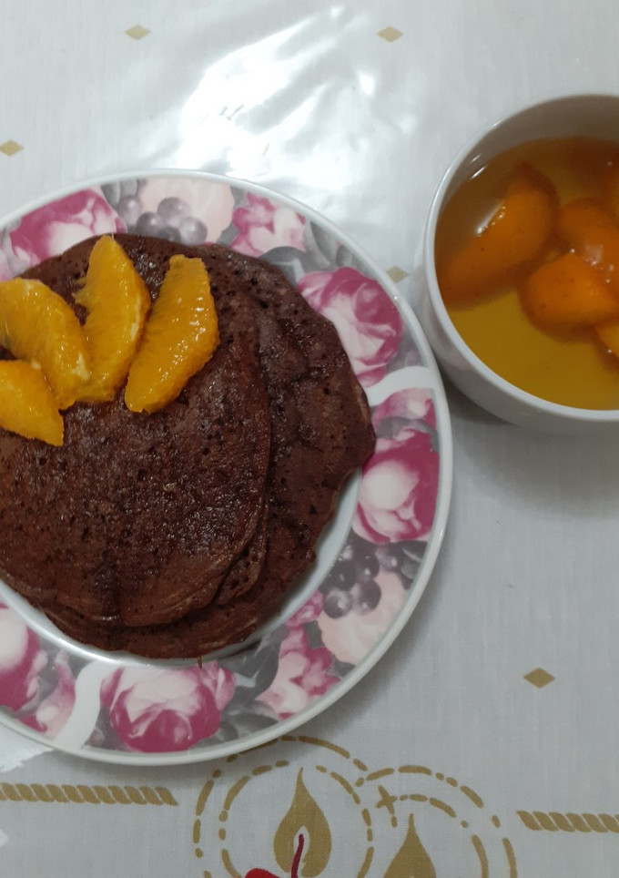 Una foto de Hot cakes de chocolate y naranja sin harina