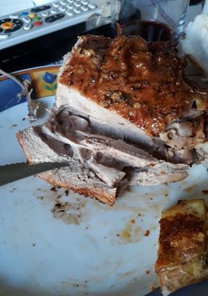 Una foto de Chivito al horno chileno