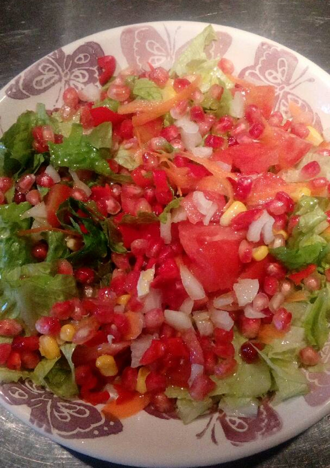 Una foto de Ensalada con granadas