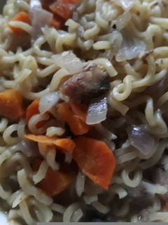 A picture of Indomine with sardine and carrots.