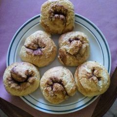 A picture of Cinnamon and jam scones.
