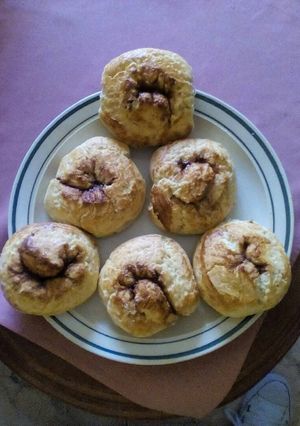 A picture of Cinnamon and jam scones.