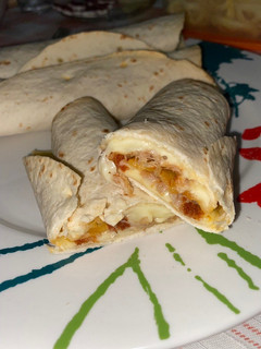 Una foto de Fajitas de carne, chorizo y queso