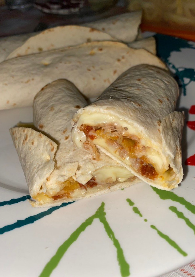 Una foto de Fajitas de carne, chorizo y queso