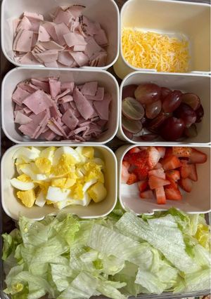 A picture of Mini salad bar using leftover lettuce from taco night.