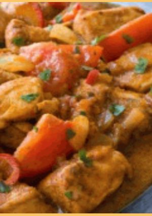 A picture of Tomato chicken curry.