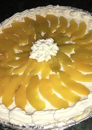 Una foto de Tarta de Durazno y crema 🥧