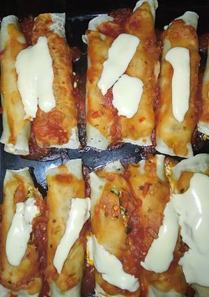 Una foto de Canelones de acelga y pollo