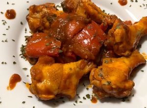 Foto di Alette di pollo con peperoni