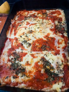 Una foto de Pescado al horno a la pizza♥️